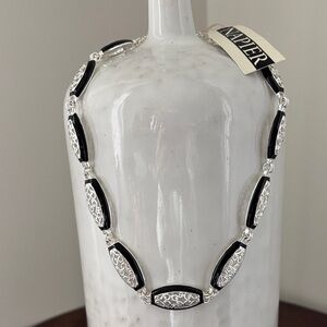 Napier Black enamel surrounding silvertone filagree soft rectangle